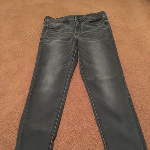 Grey faded jeans